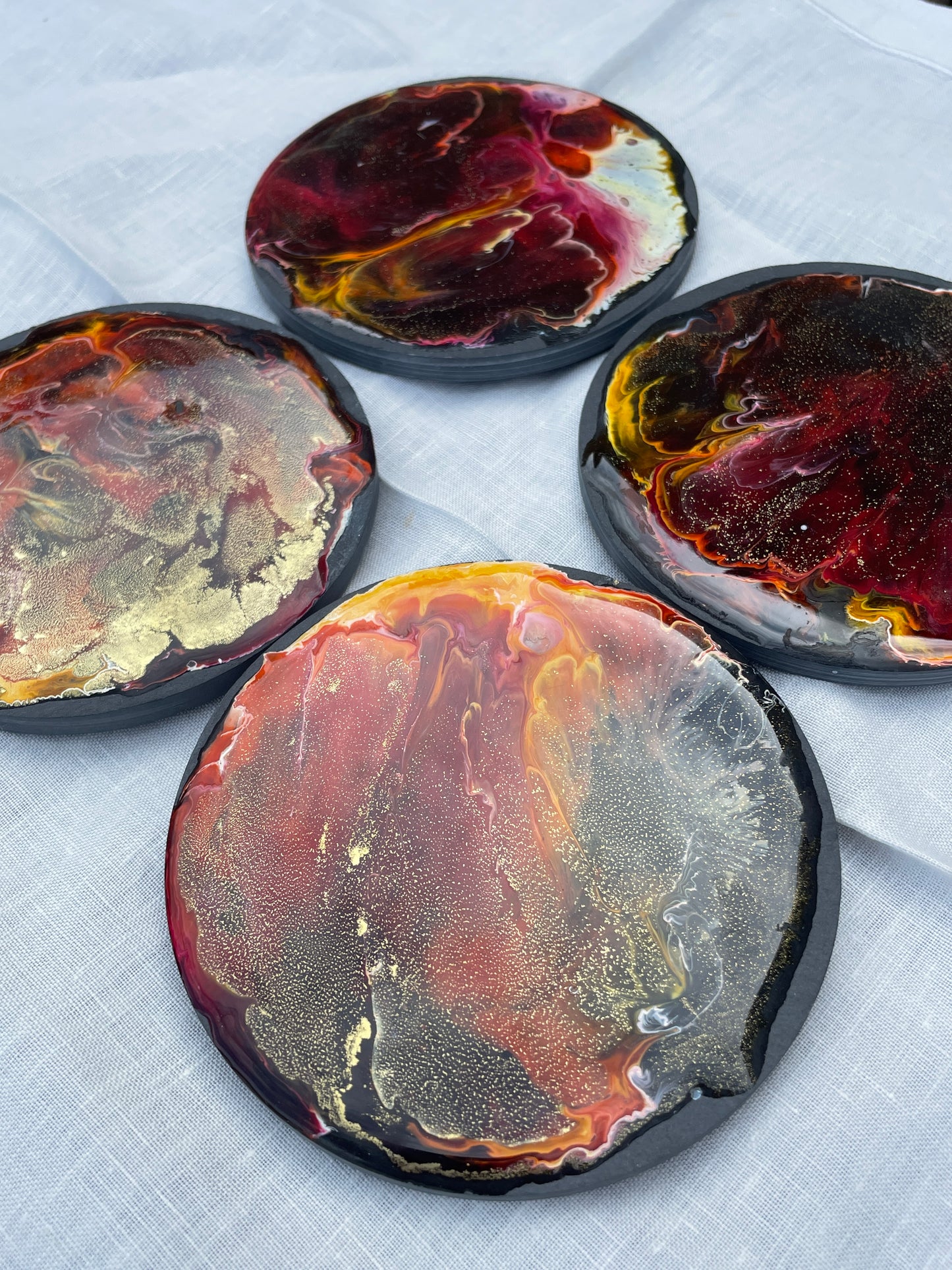 Posavasos redondos de pizarra y resina.