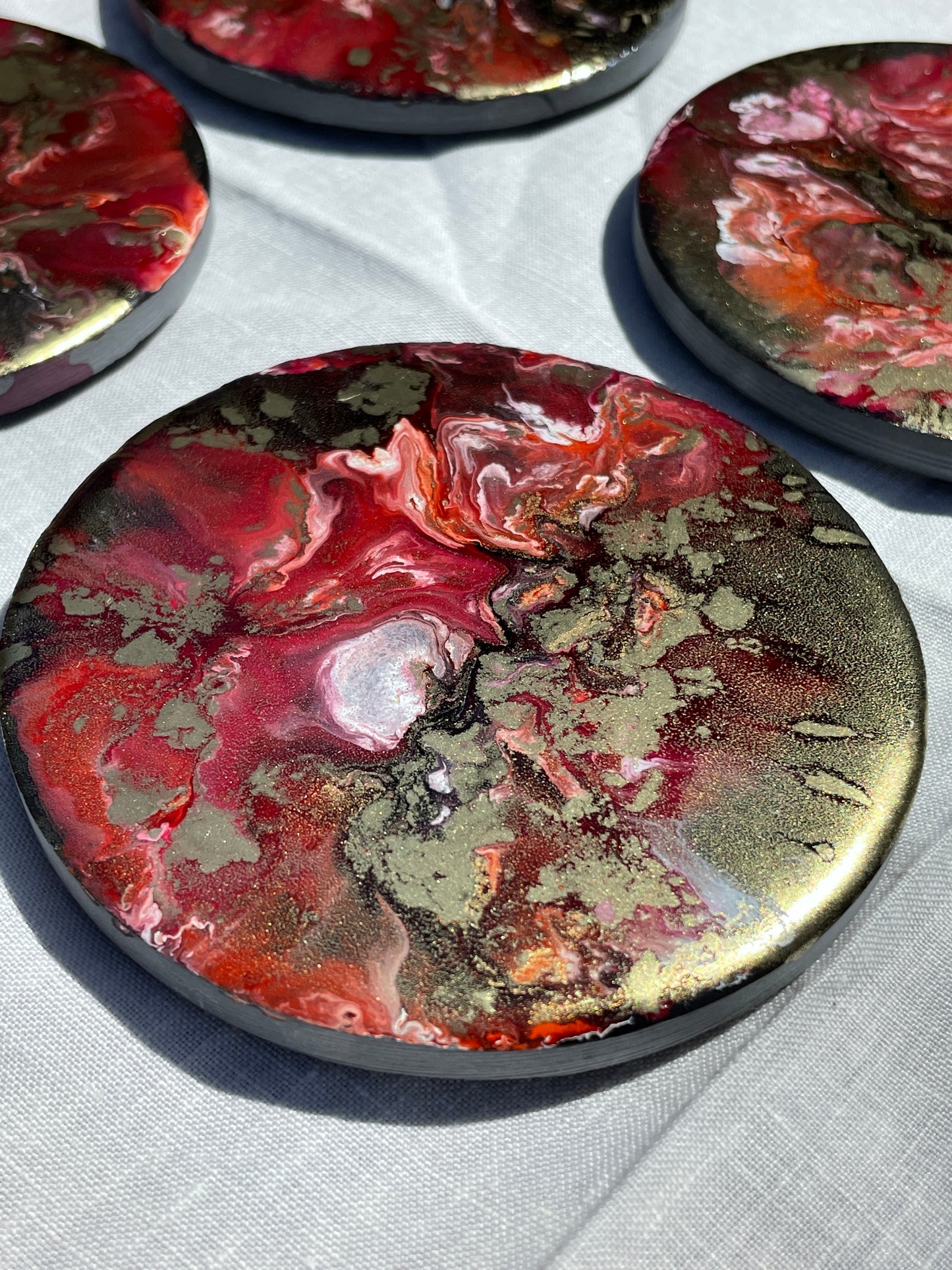 Posavasos redondos de pizarra y resina.