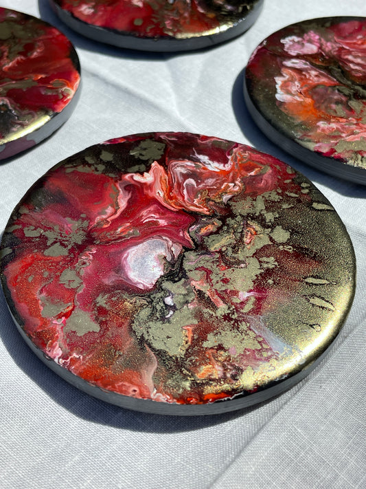 Posavasos redondos de pizarra y resina.